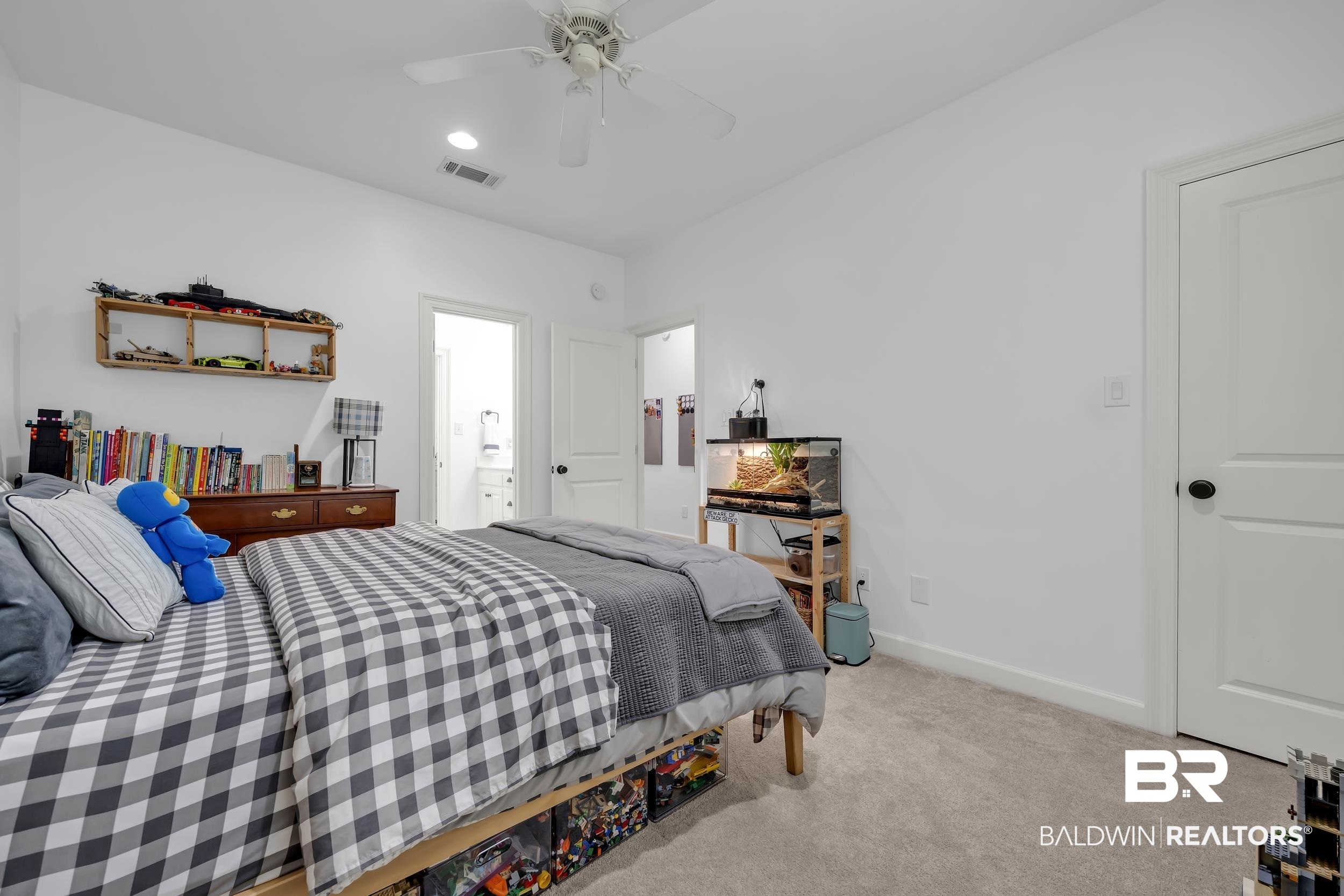 8137 Pine Run Daphne, AL 36527 - Photo 30 of 67 Spacious room featuring light-colored carpeting, white walls, and a ceiling fan with integrated lighting