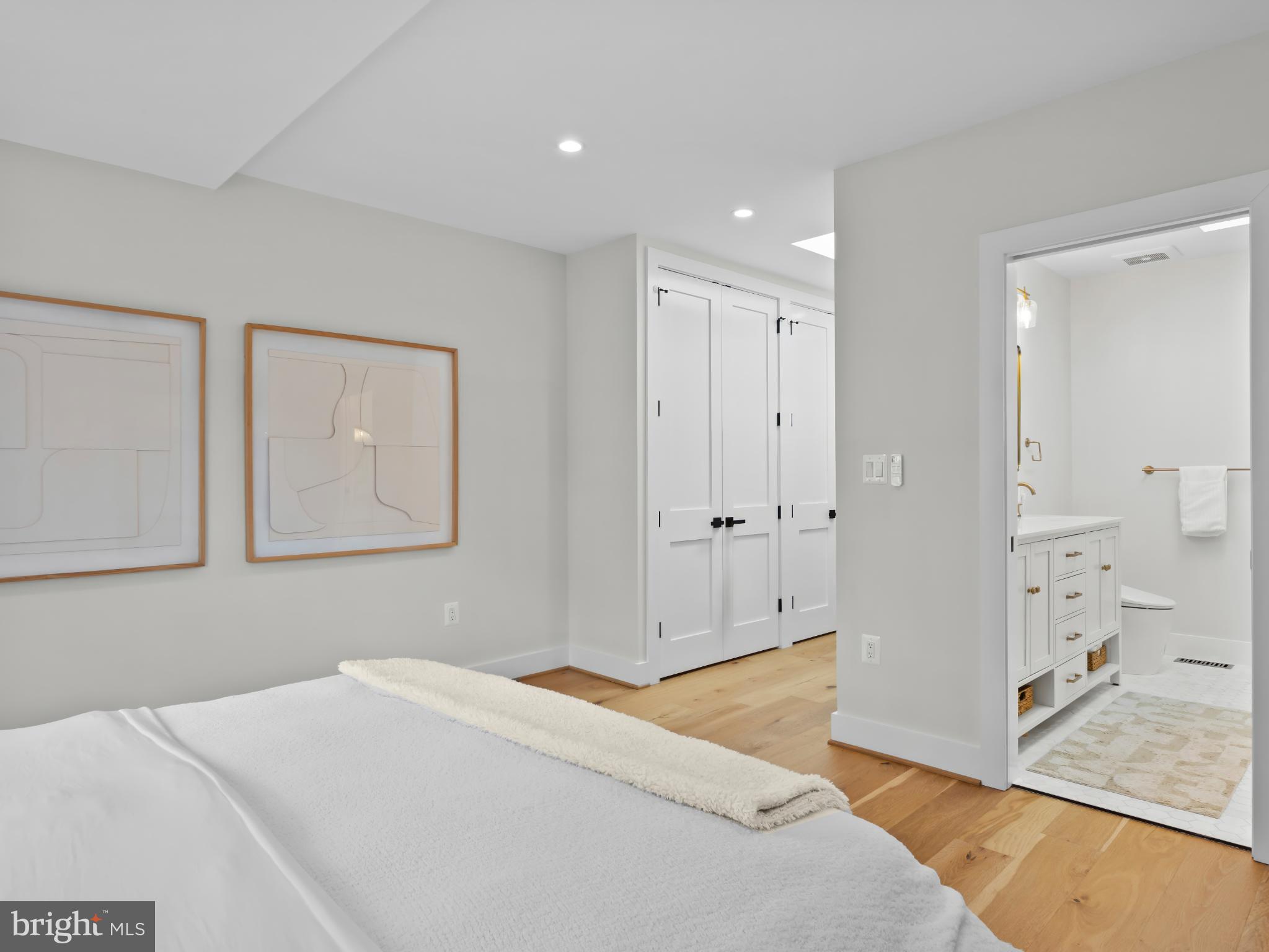 910 8th Street Northeast Washington, DC 20002 - Photo 31 of 54 a bedroom with a bed and hallway