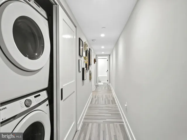 a picture of a room that has a lot of windows