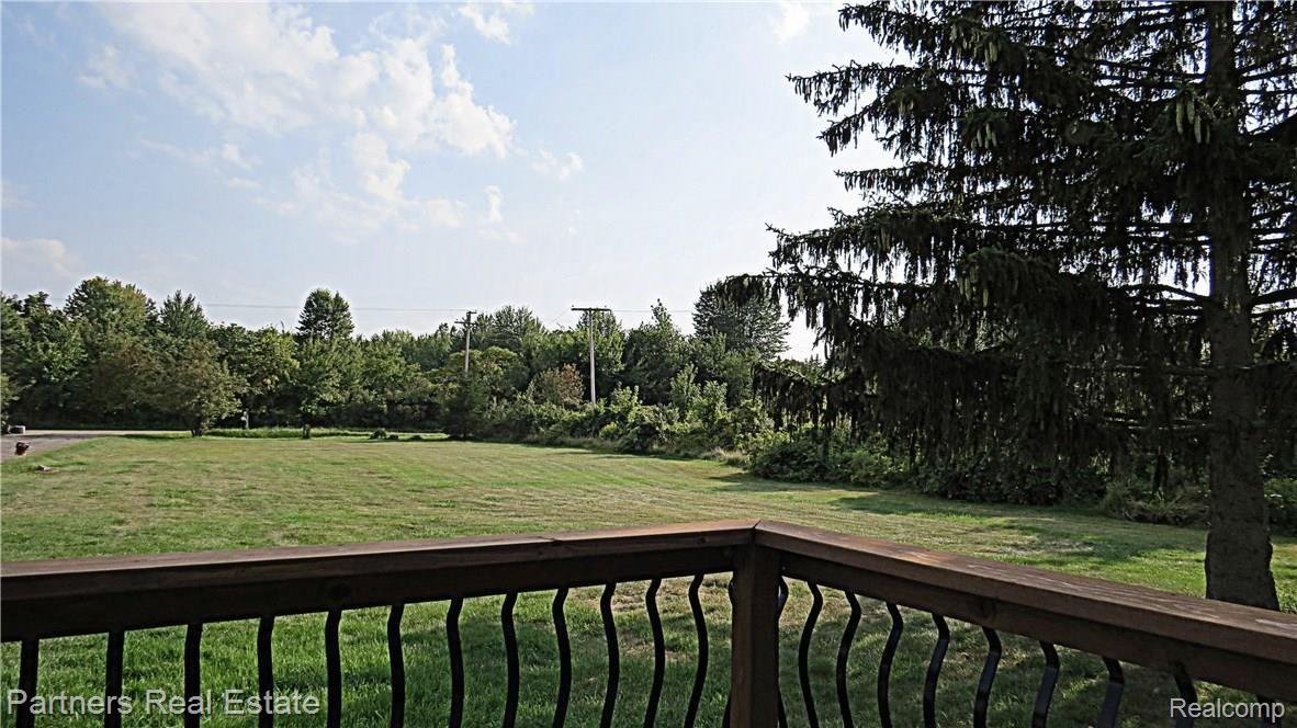 4850 Deal Road Fowlerville, MI 48836 - Photo 11 of 49 A Glance of the Gorgeous Front Acreage from Front Deck to Home