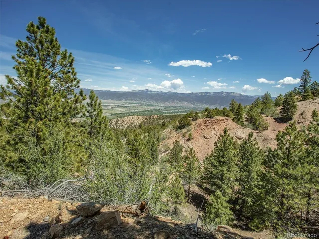 a view of a golf course with a lake