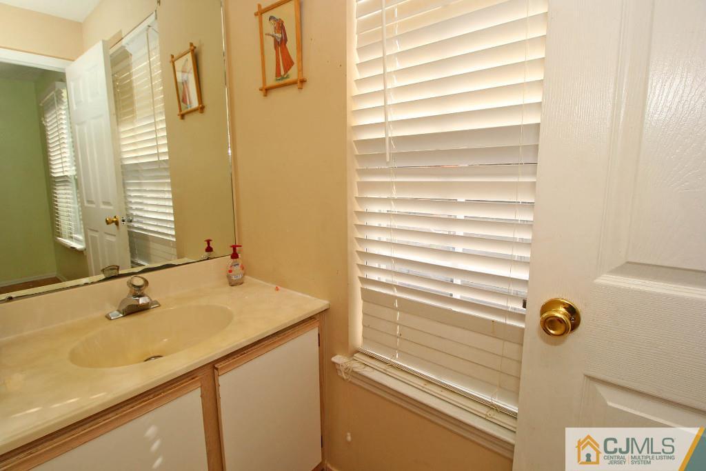 37 Inverness Drive Edison, NJ 08820 - Photo 15 of 25 a bathroom with a sink and a shower