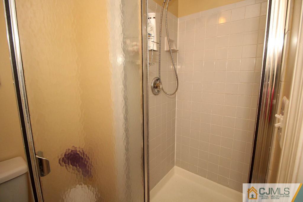 37 Inverness Drive Edison, NJ 08820 - Photo 20 of 25 a bathroom with a shower