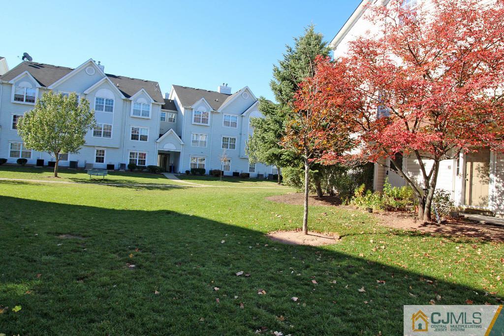 37 Inverness Drive Edison, NJ 08820 - Photo 24 of 25 a view of a big house with a big yard and large trees