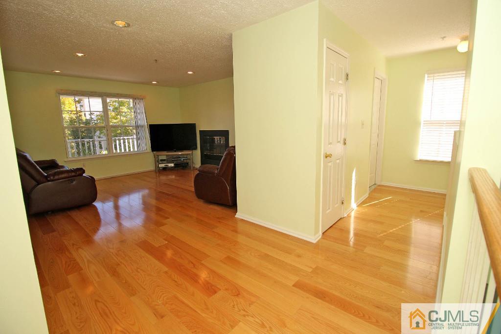 37 Inverness Drive Edison, NJ 08820 - Photo 7 of 25 a living room with furniture and a flat screen tv