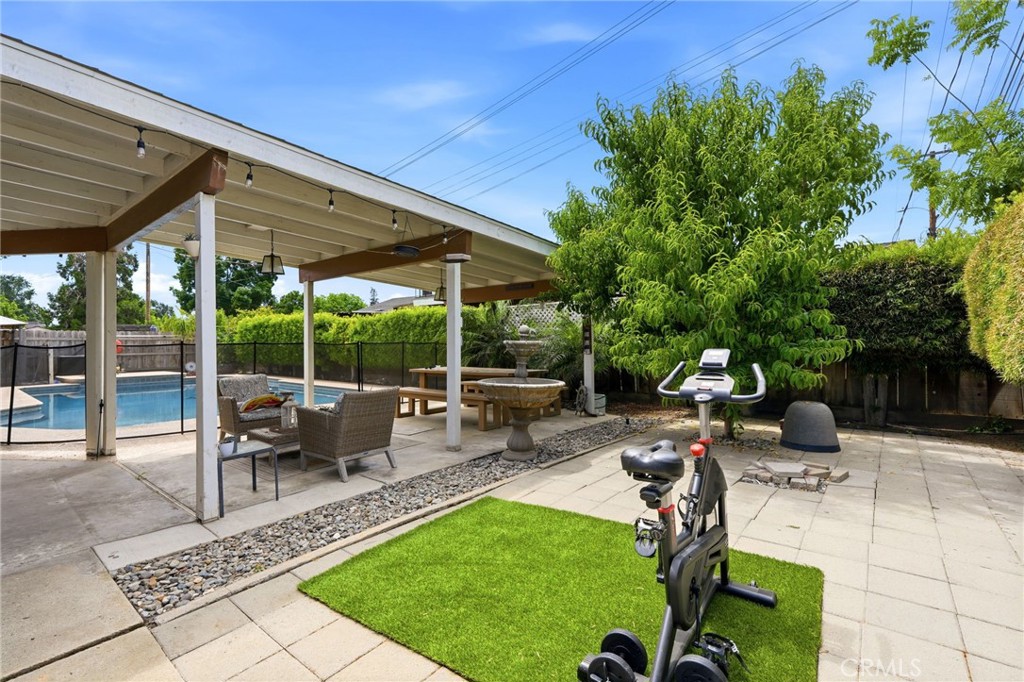 1237 South Clover Street Visalia, CA 93277 - Photo 25 of 30 a view of a backyard with sitting area