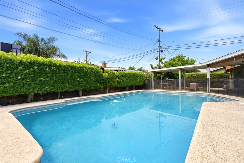 1237 South Clover Street Visalia, CA 93277 - Photo 29 of 30 a view of a swimming pool with a patio