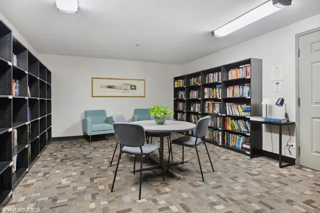 a view of a workspace with furniture