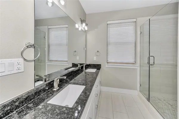 a kitchen with a sink and a stove