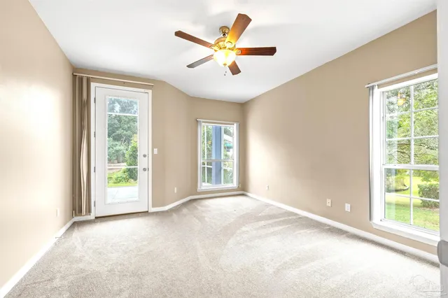 a bathroom with a granite countertop toilet a sink and a bathtub