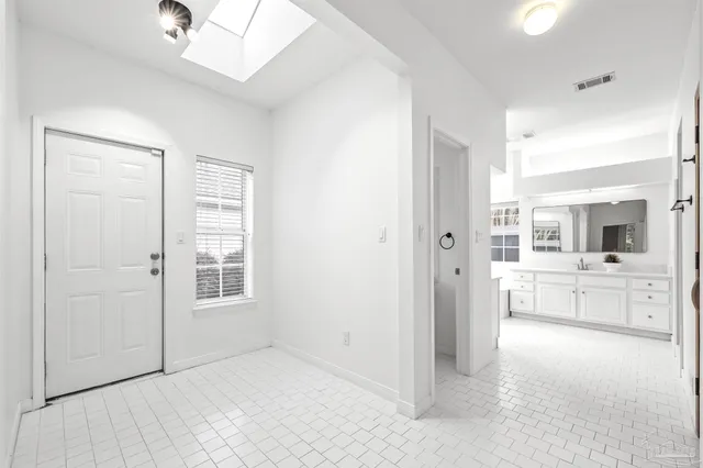 a view of storage and utility room