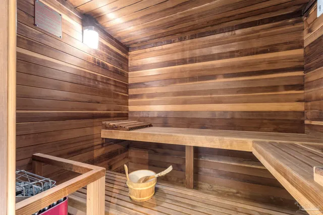 a bathroom with a sink mirror toilet and shower