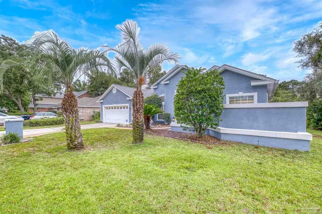 a house view with a garden space