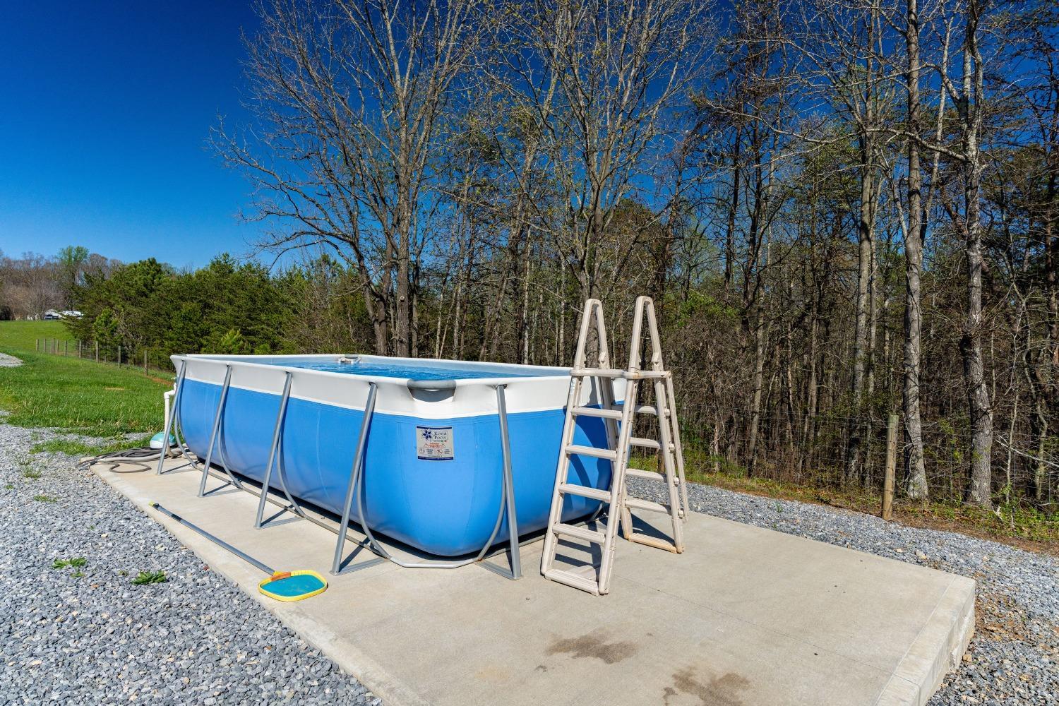 1088 Foster Road Thaxton, VA 24174 - Photo 41 of 92 a view of a backyard with a wooden fence