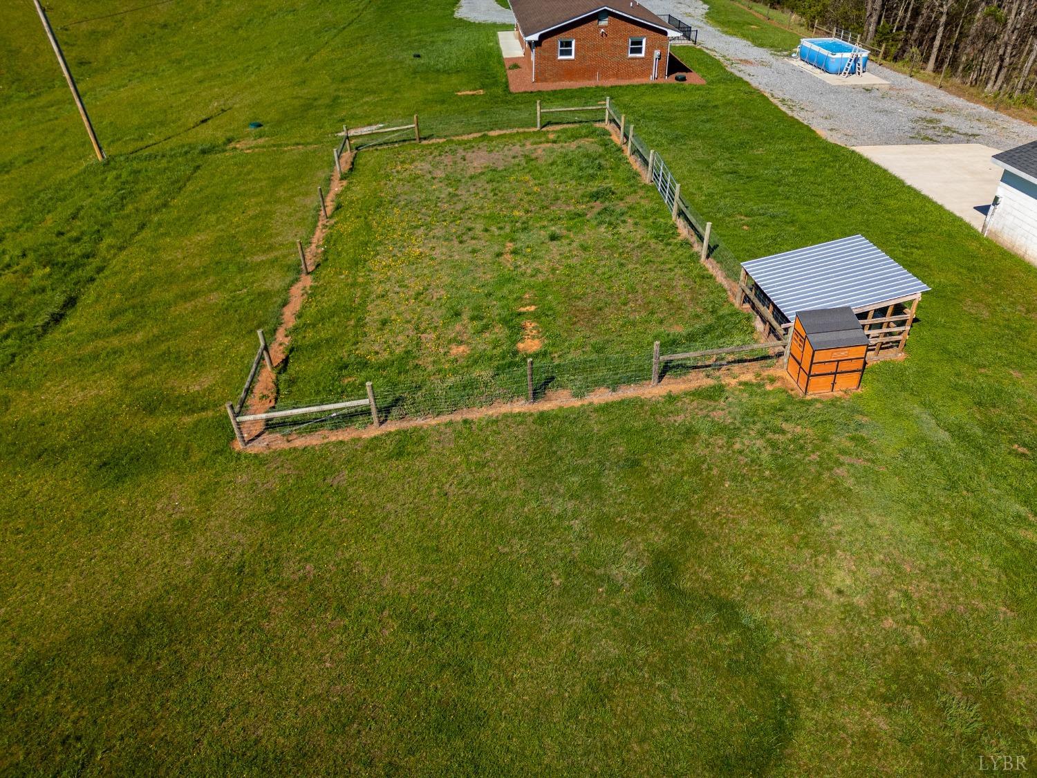 1088 Foster Road Thaxton, VA 24174 - Photo 56 of 92 a backyard of a house with table and chairs