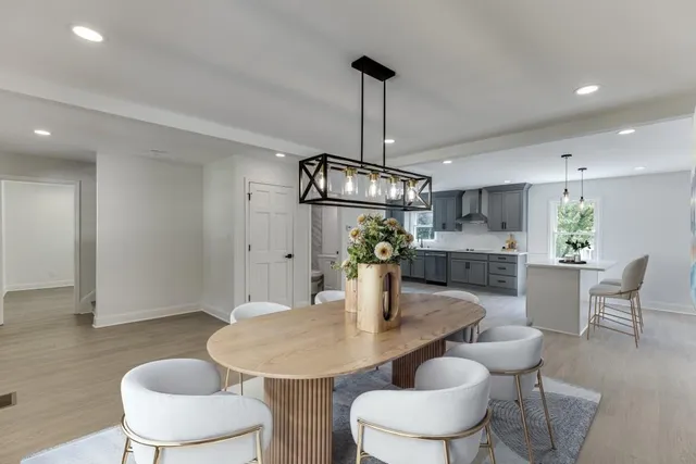 a view of an empty room with window and cabinet