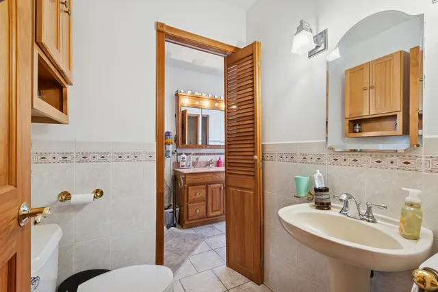 a view of house with a yard