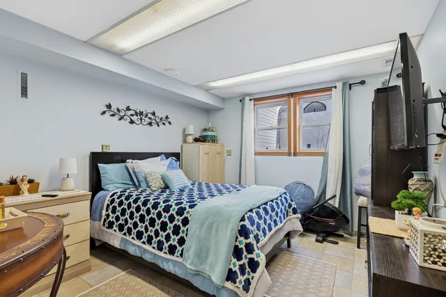 a bathroom with a sink toilet and vanity