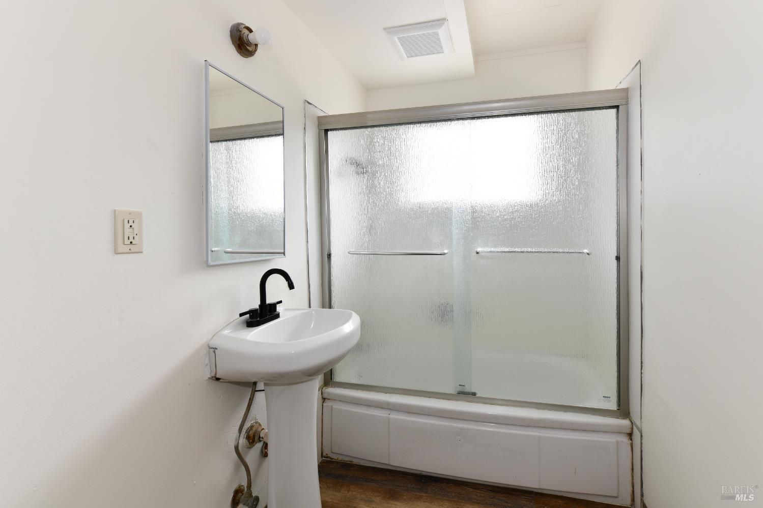 1577 Silverado Trail Napa, CA 94559 - Photo 17 of 30 a bathroom with a sink toilet and shower