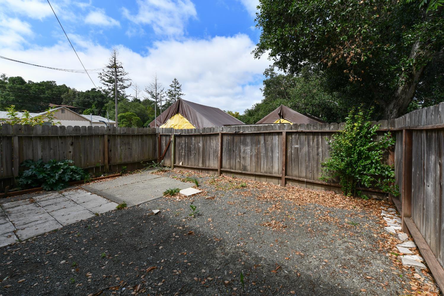 1577 Silverado Trail Napa, CA 94559 - Photo 19 of 30 a view of a backyard with wooden fence