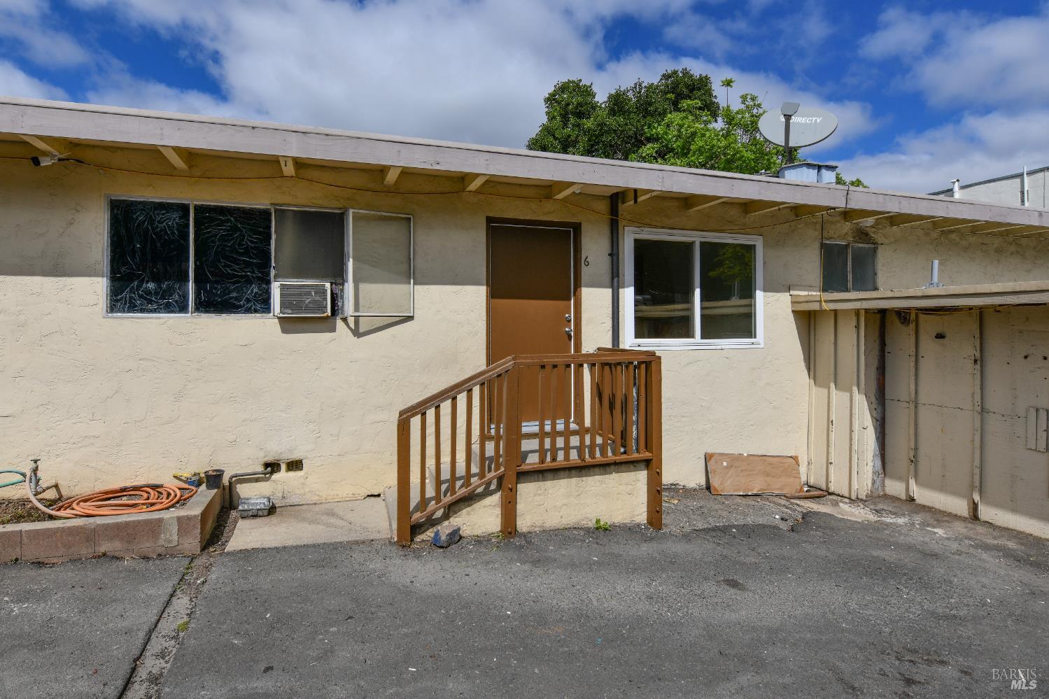 1577 Silverado Trail Napa, CA 94559 - Photo 22 of 30 a view of a house with a small yard and wooden fence