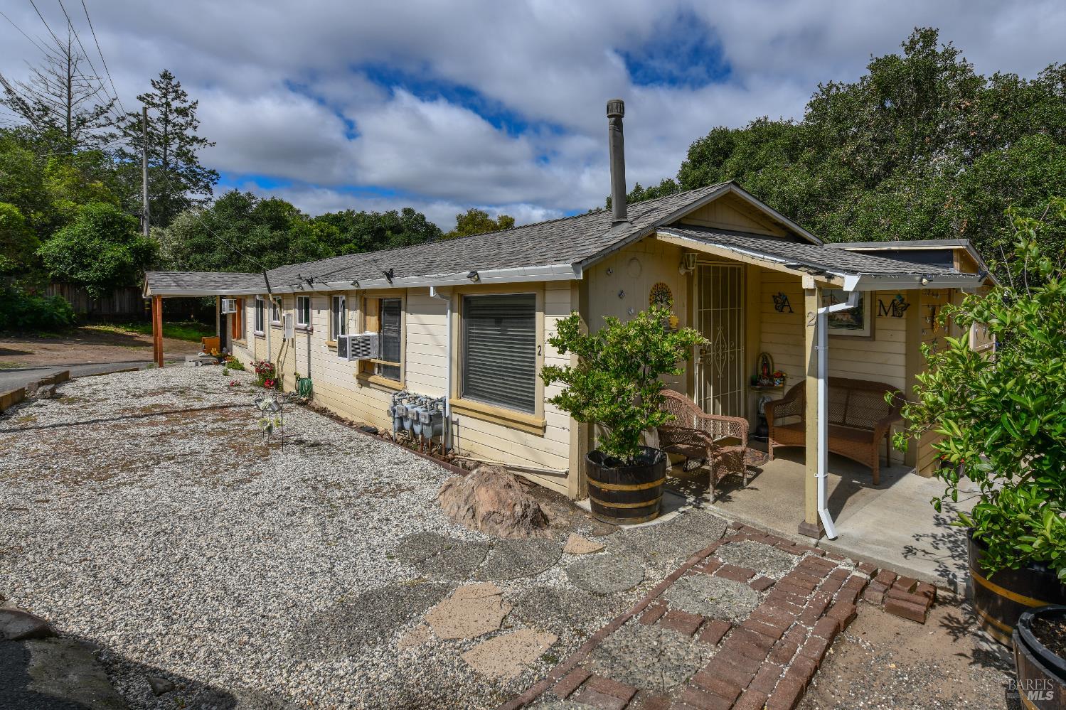 1577 Silverado Trail Napa, CA 94559 - Photo 27 of 30 a front view of a house with garden
