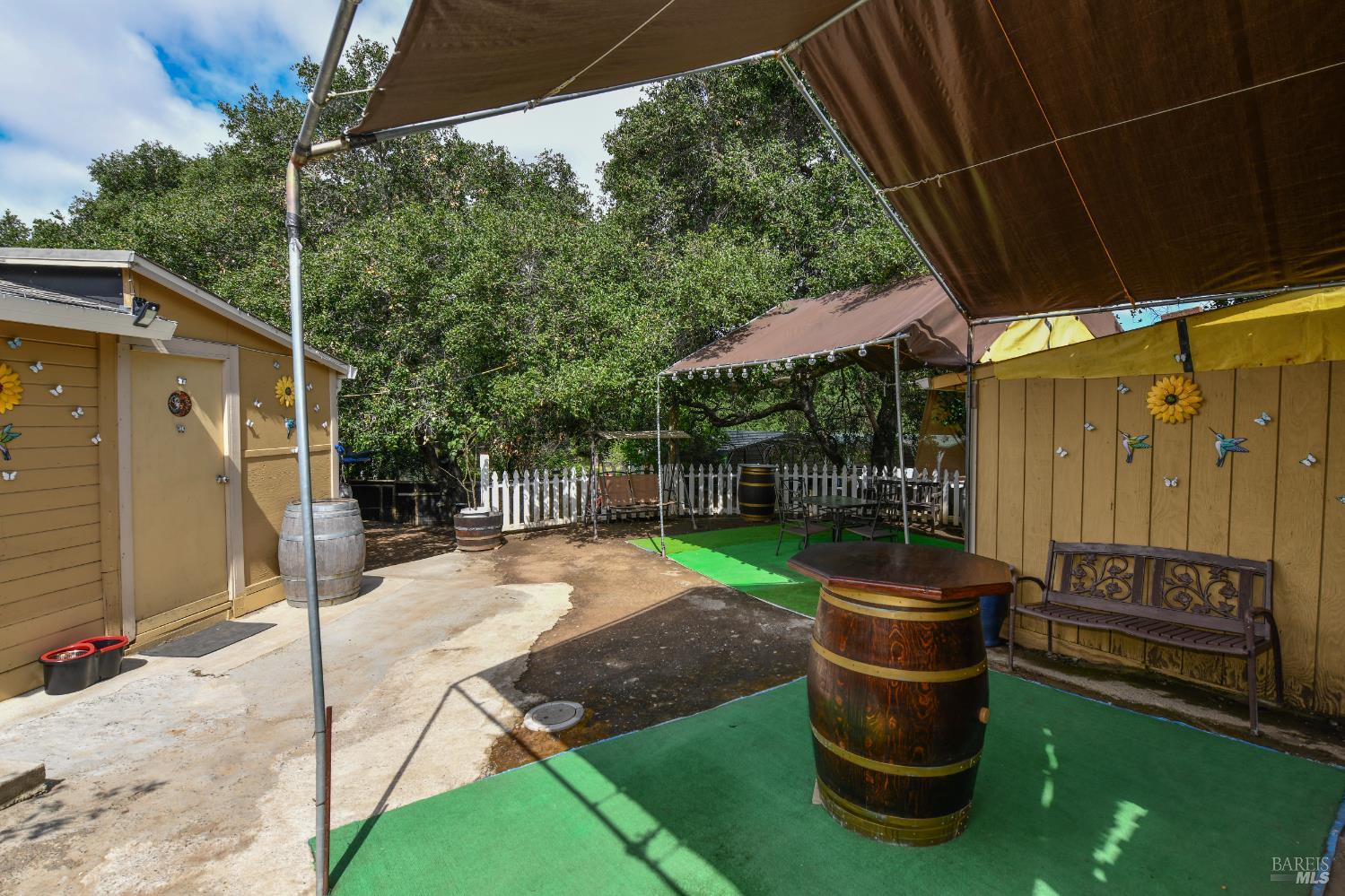1577 Silverado Trail Napa, CA 94559 - Photo 28 of 30 a view of a patio with chair and tables