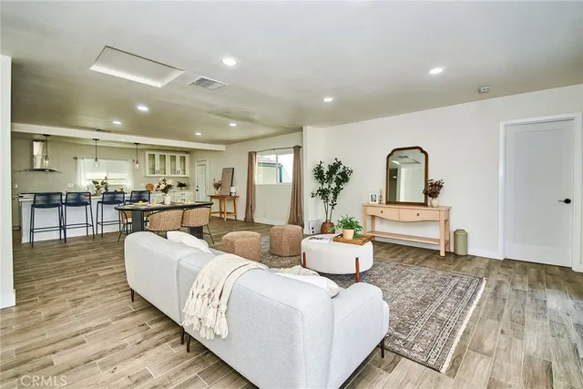 a living room with furniture and a table