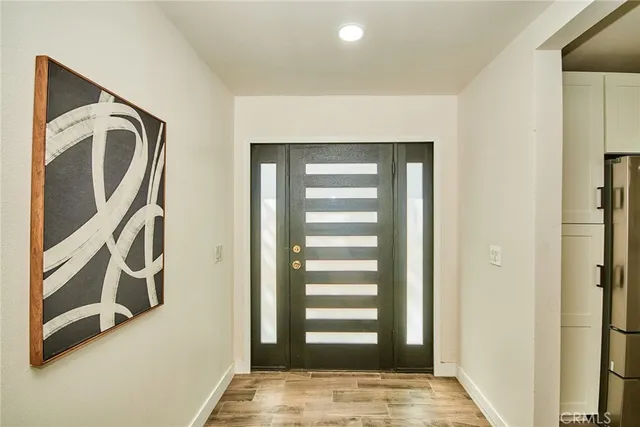 a view of an entryway with a door