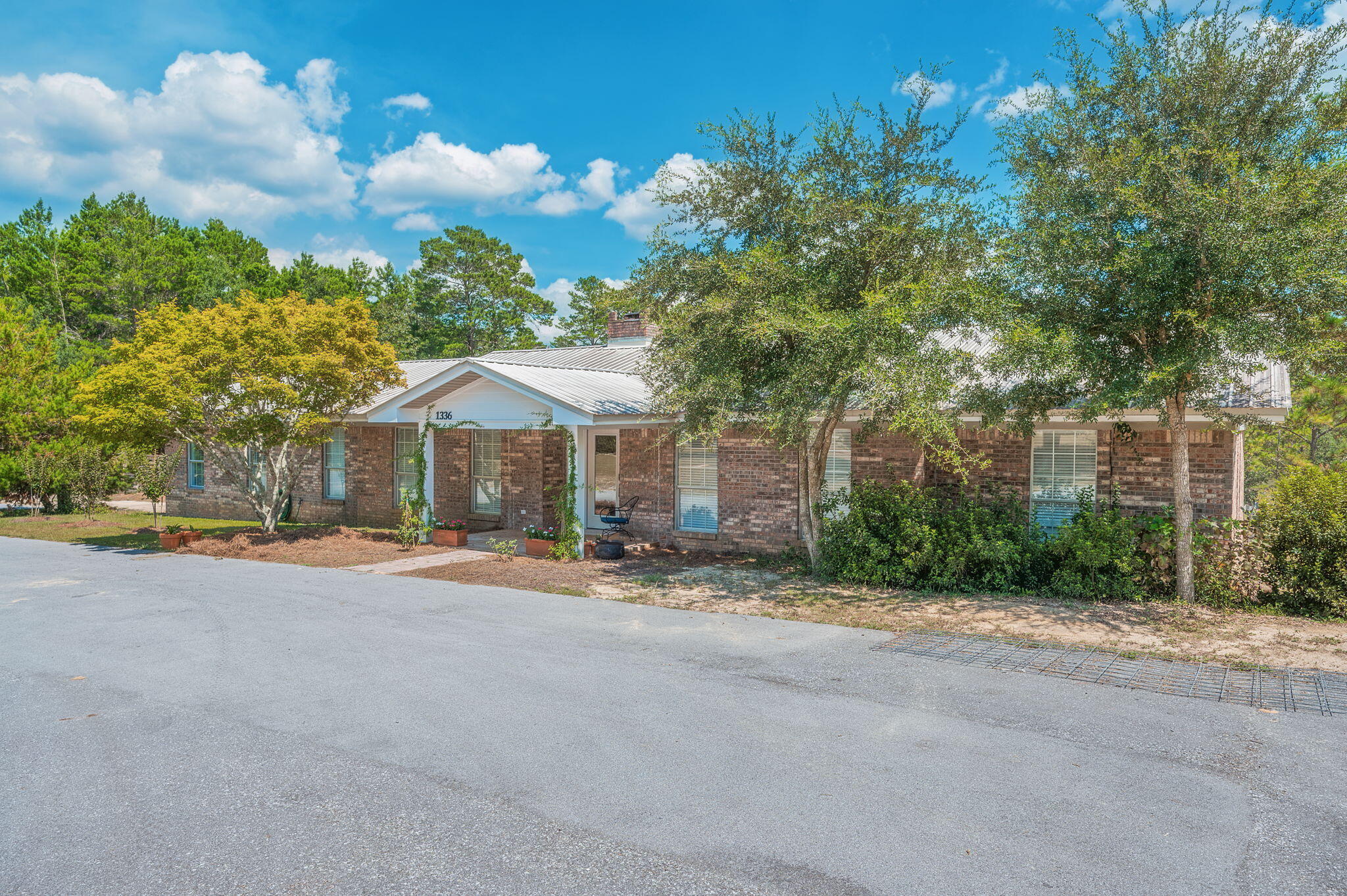 a view of a house with a yard and garage