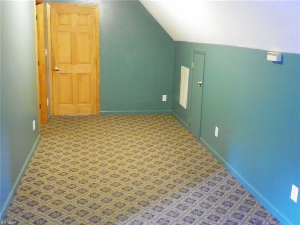 390 Will Snider Road Linwood, NC 27299 - Photo 14 of 25 Setting room Upstairs