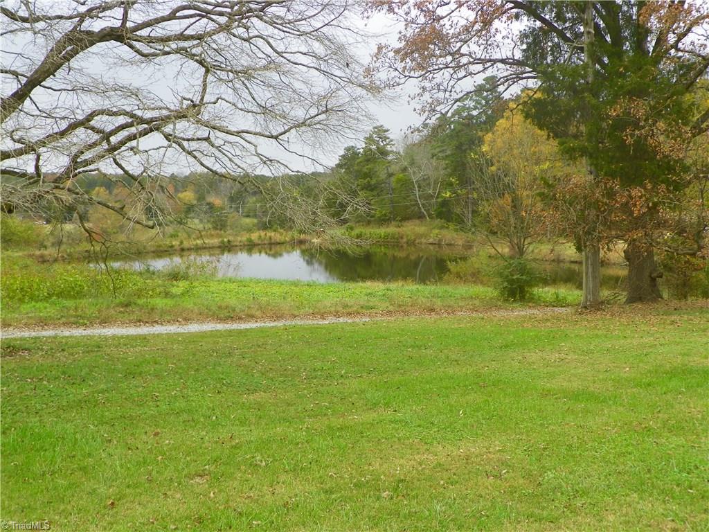 390 Will Snider Road Linwood, NC 27299 - Photo 19 of 25 View from rear deck of pond