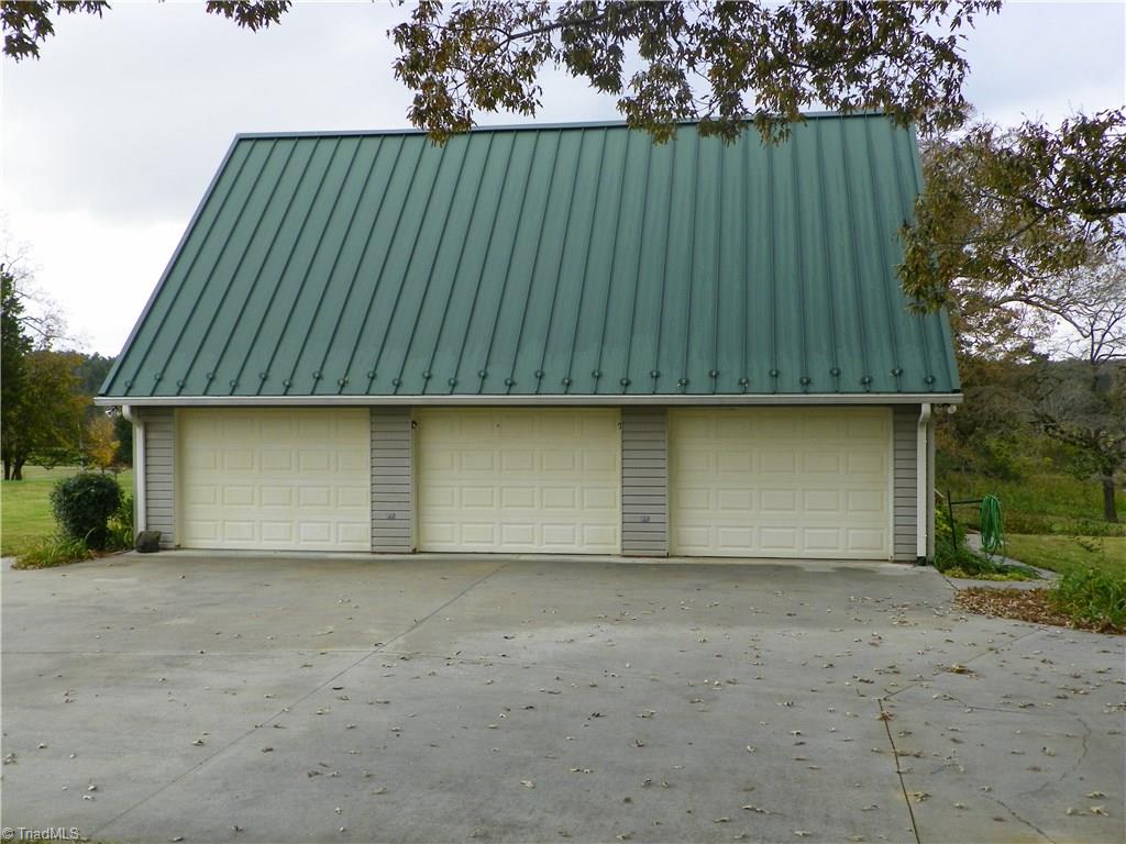 390 Will Snider Road Linwood, NC 27299 - Photo 23 of 25 Garage side view