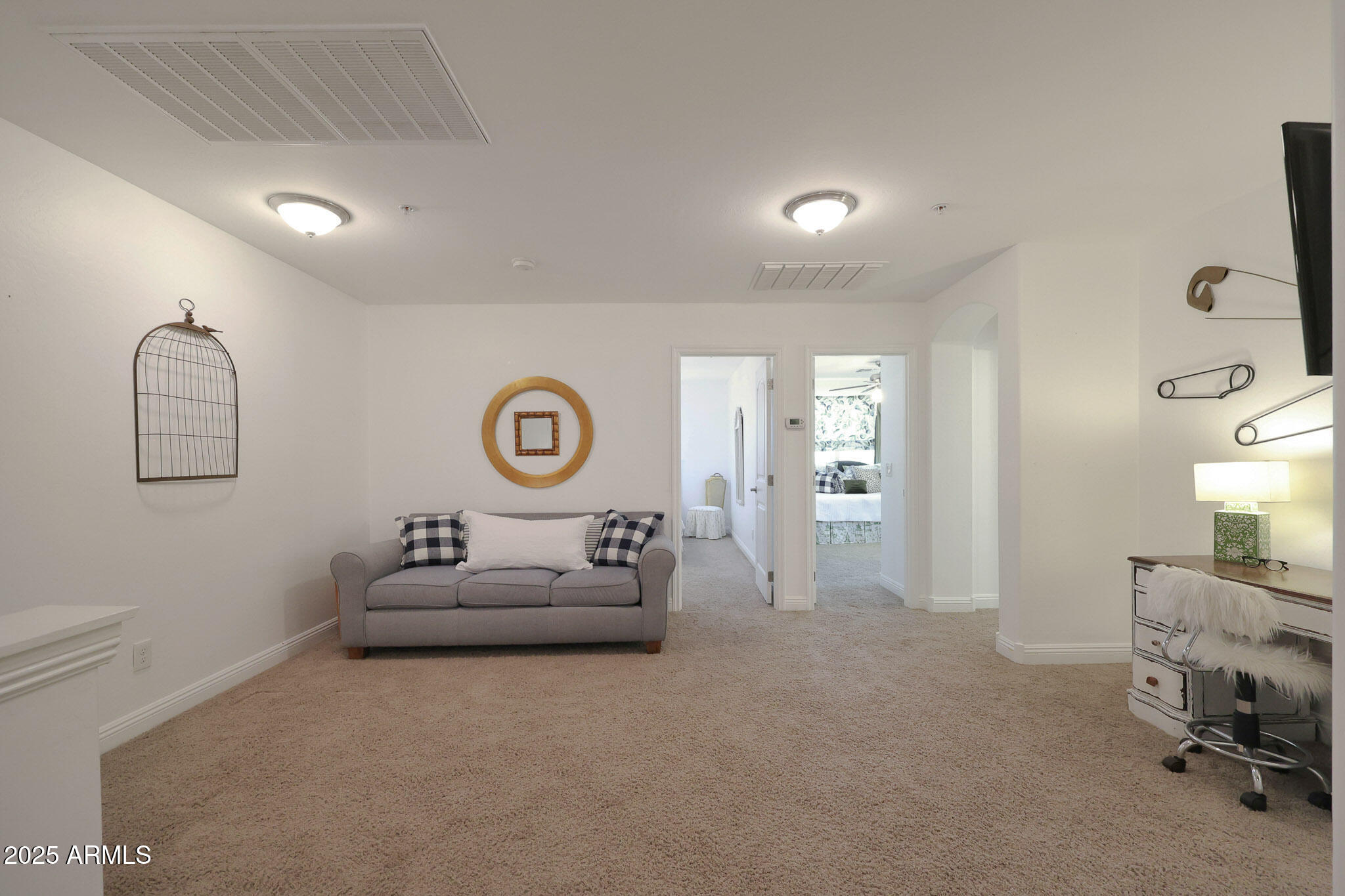 20563 West White Rock Road Buckeye, AZ 85396 - Photo 21 of 44 a living room with furniture and a table