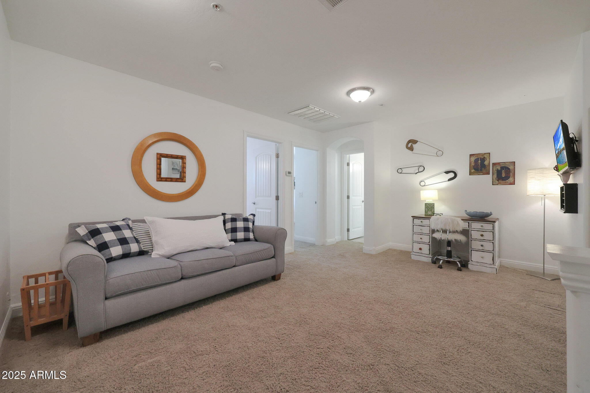 20563 West White Rock Road Buckeye, AZ 85396 - Photo 22 of 44 a living room with furniture and a table