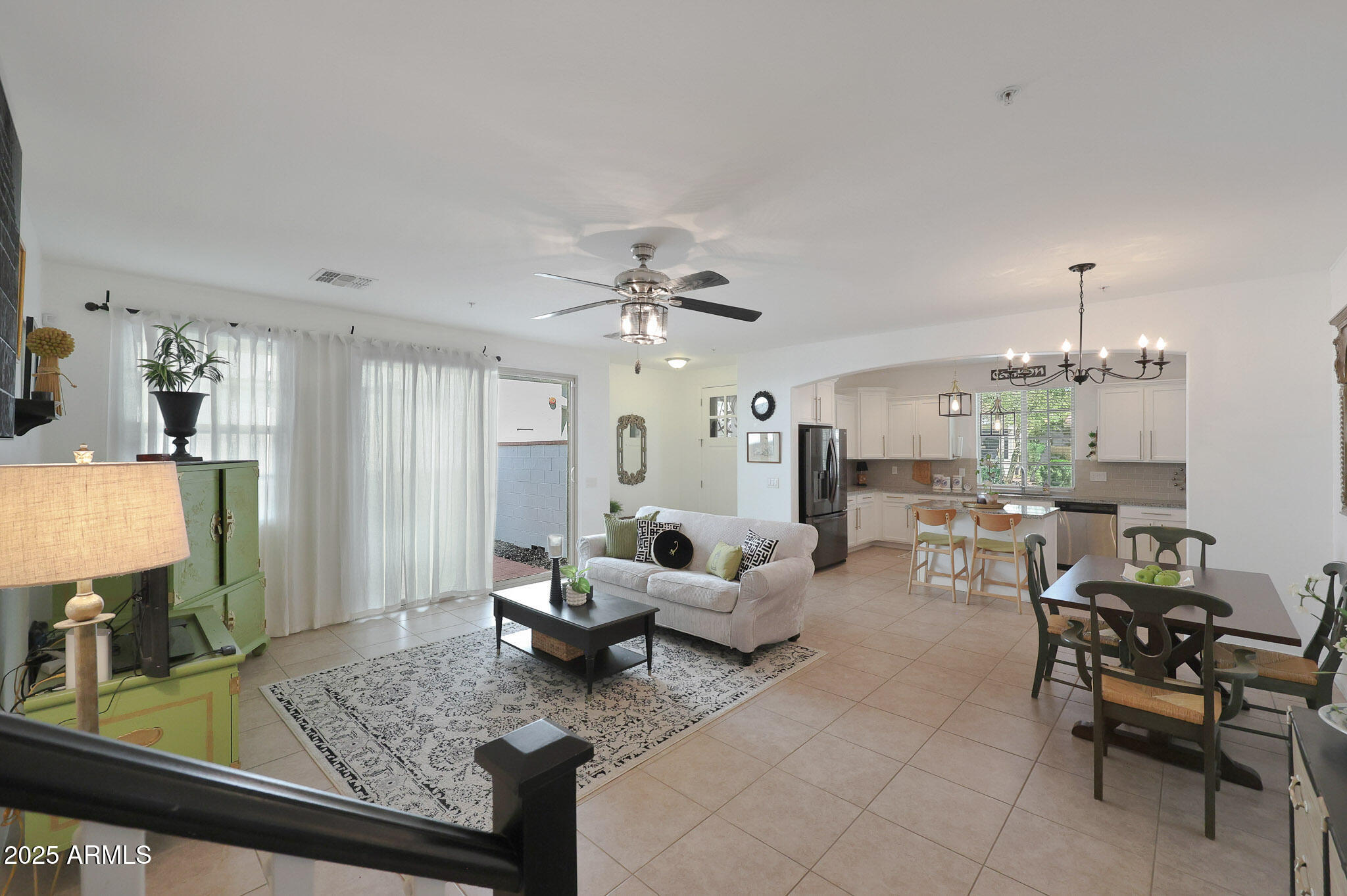 20563 West White Rock Road Buckeye, AZ 85396 - Photo 7 of 44 a living room with furniture and wooden floor