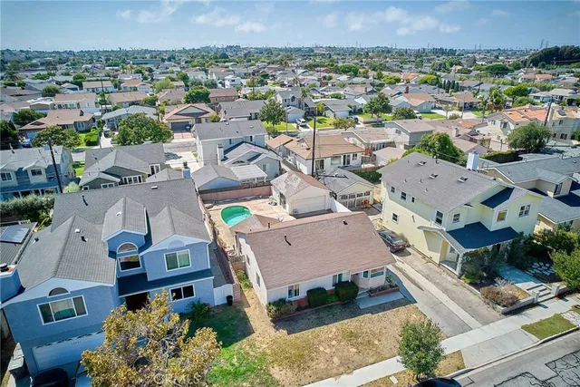 an aerial view of a city with lots of residential buildings