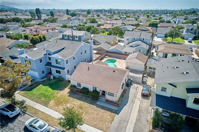 an aerial view of a house with a garden