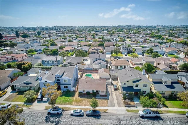 an aerial view of a city with lots of residential buildings