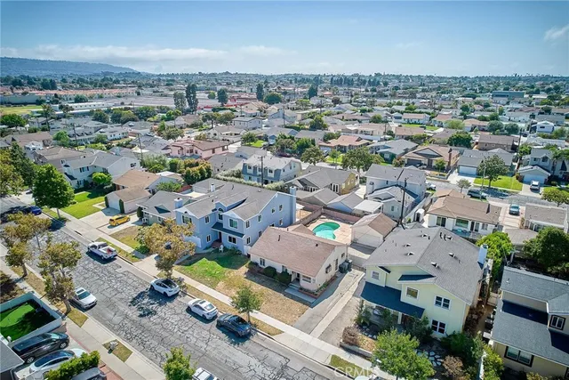 an aerial view of a city with lots of residential buildings