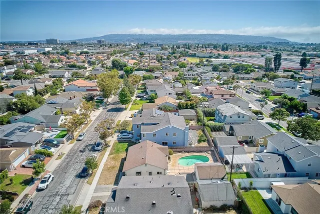 an aerial view of a city with lots of residential buildings