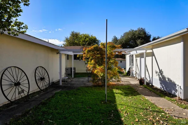 a view of a back yard of the house