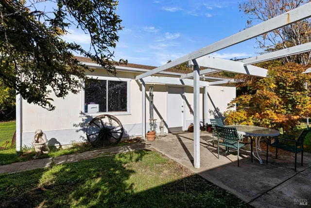 a view of a backyard with a garden
