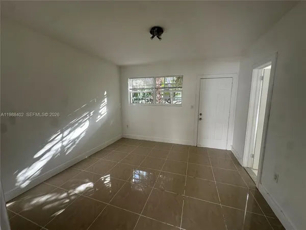 a kitchen with stainless steel appliances a refrigerator and a stove