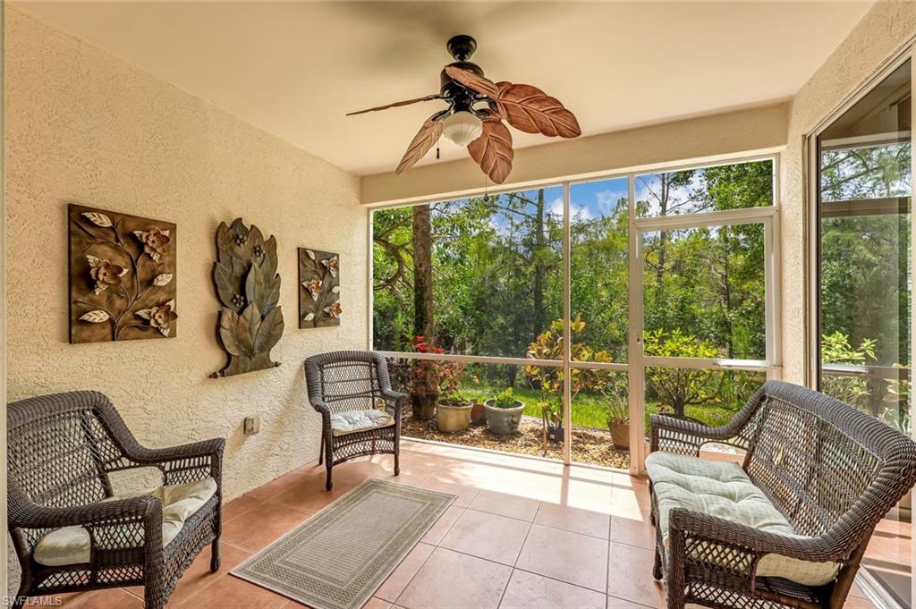 1345 Henley Street, Unit 706 Naples, FL 34105 - Photo 17 of 20 a living room with furniture and a window