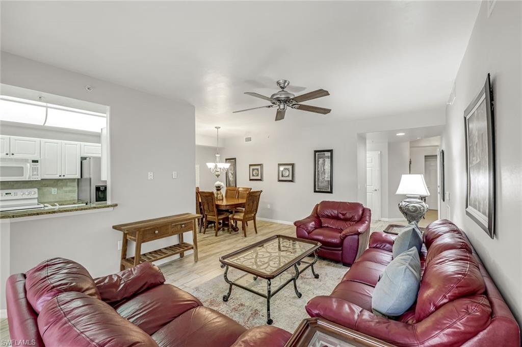 1345 Henley Street, Unit 706 Naples, FL 34105 - Photo 4 of 20 a living room with furniture