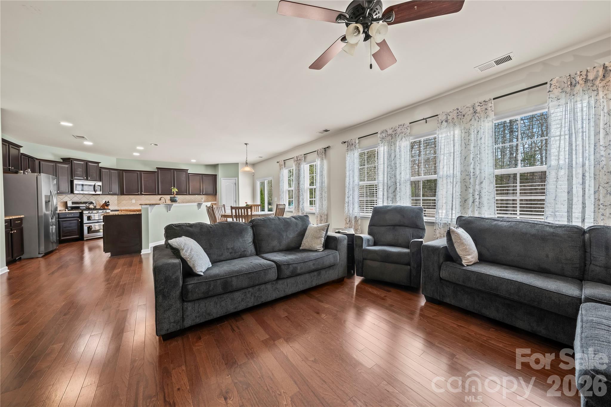 10666 Sapphire Trail Davidson, NC 28036 - Photo 14 of 34 a living room with furniture and a large window