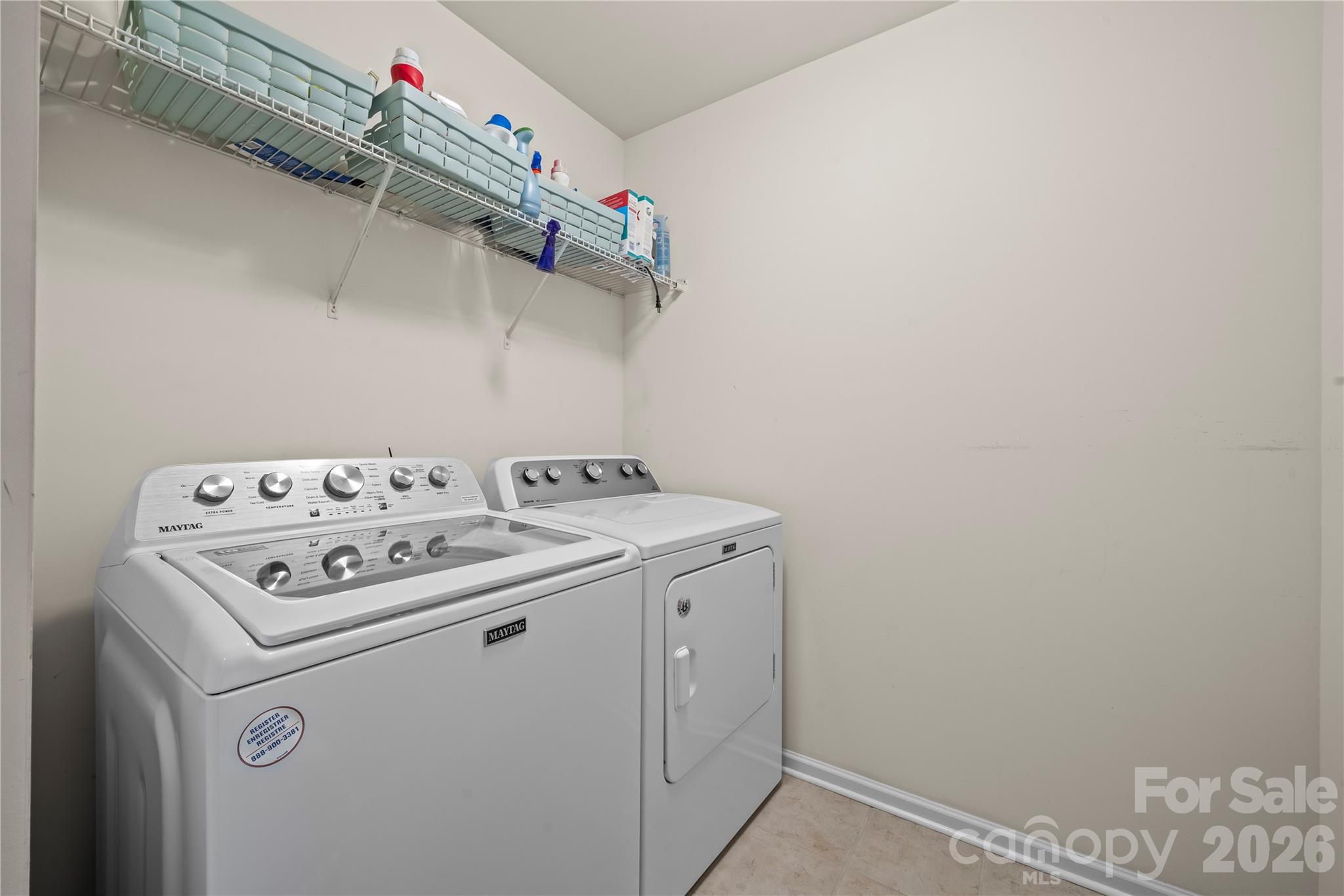 10666 Sapphire Trail Davidson, NC 28036 - Photo 30 of 34 a utility room with dryer and washer