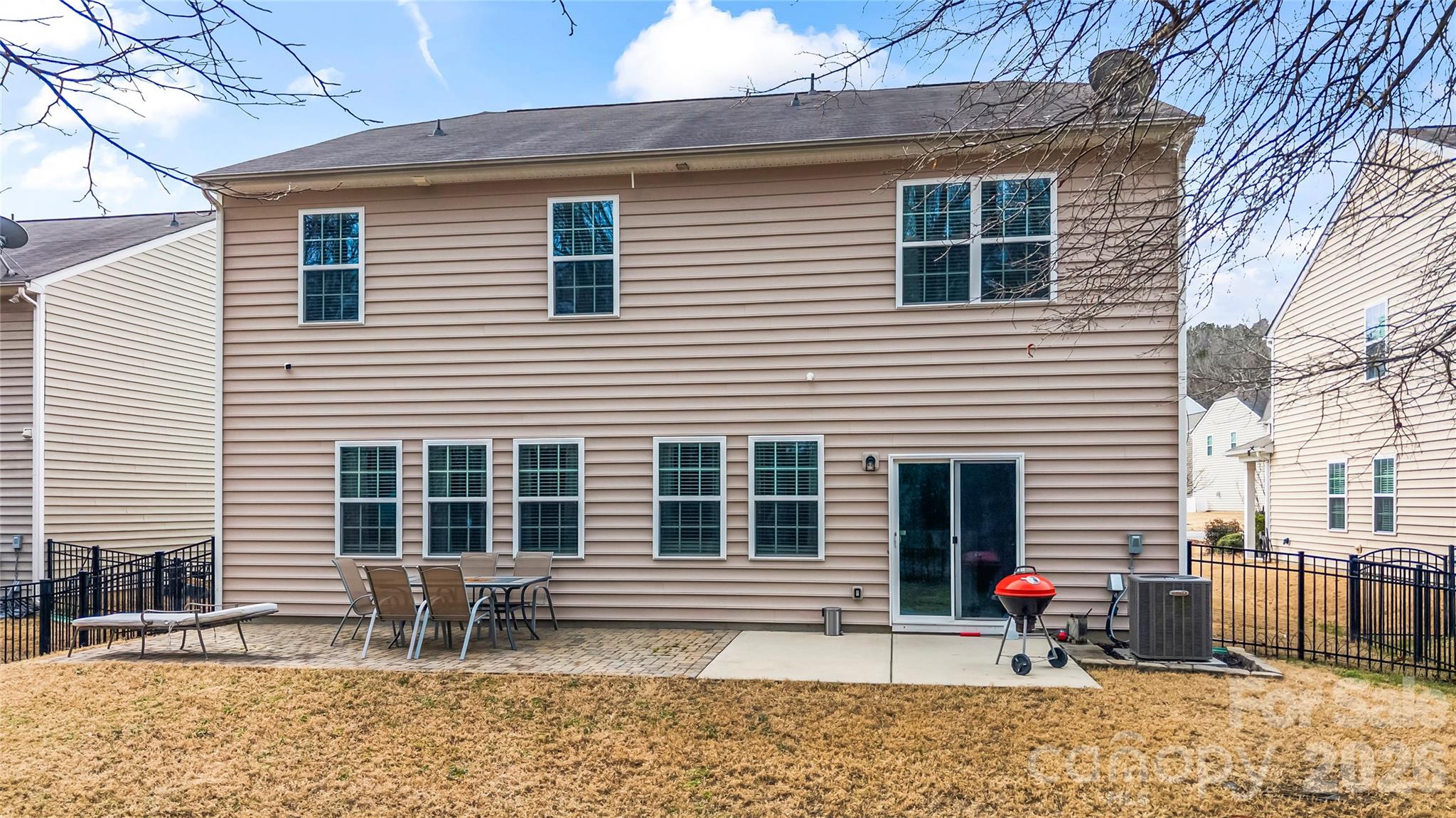 10666 Sapphire Trail Davidson, NC 28036 - Photo 31 of 34 a view of house with outdoor space and seating area