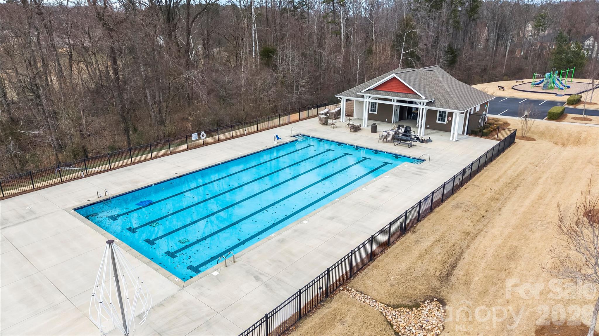 10666 Sapphire Trail Davidson, NC 28036 - Photo 33 of 34 a roof deck with a table and chairs